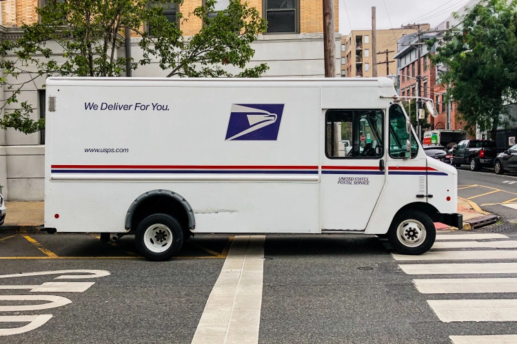 usps truck delivering mail