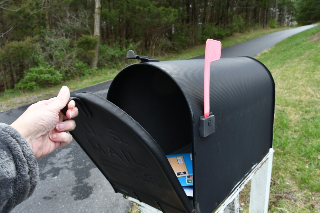 mailbox with mail in it