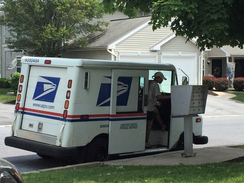 usps truck delivering mail