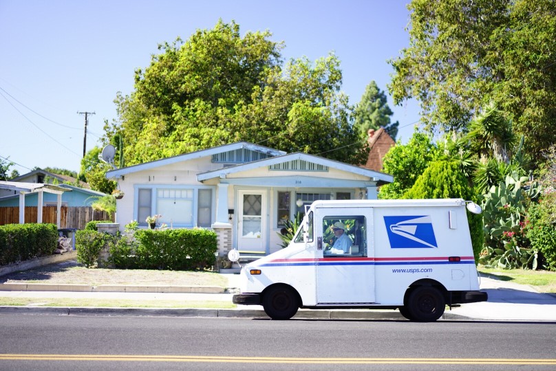 usps truck delivering mail