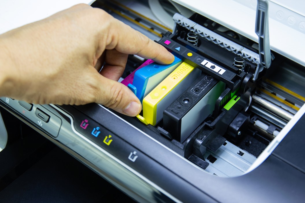 adding a printing cartridge into a printer