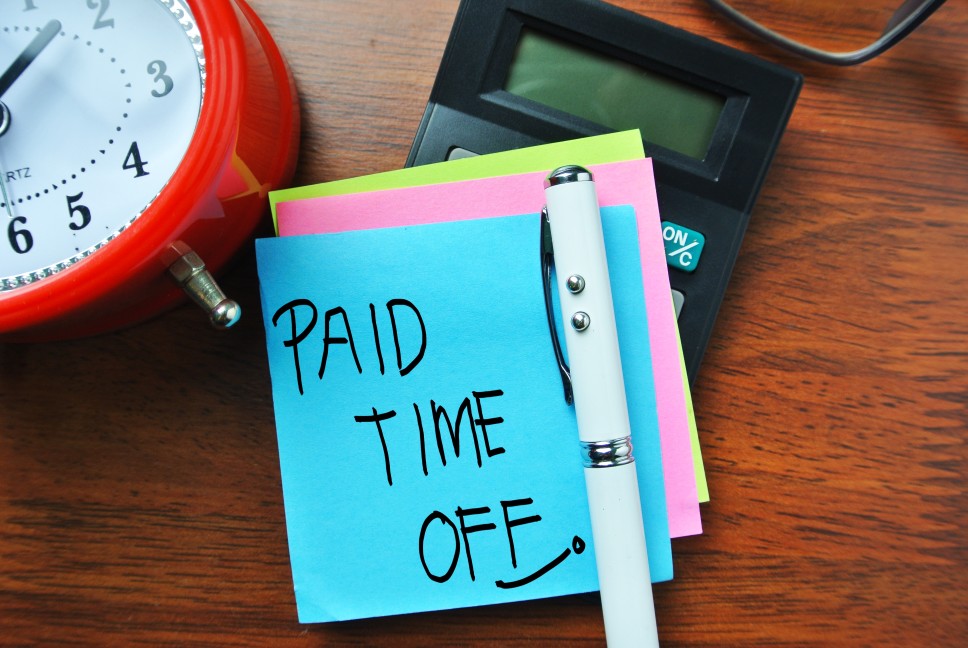 sticky note that says "paid time off"