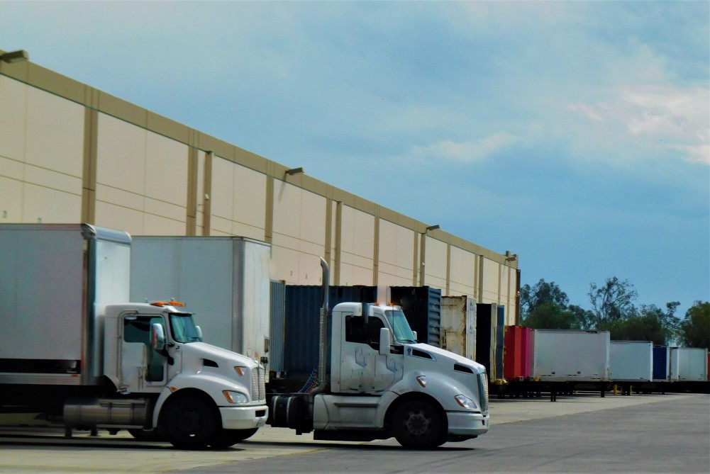 trucks outside a distribution center