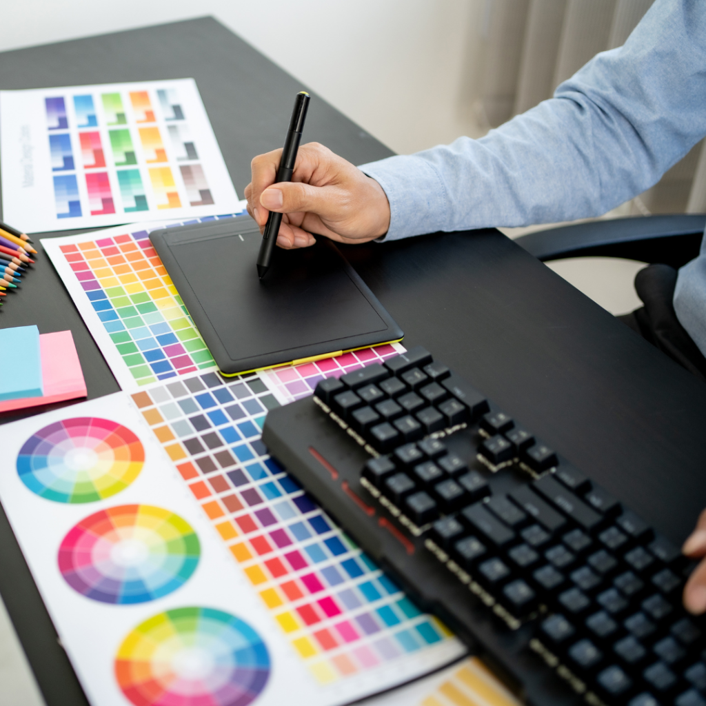 designer reviewing color wheels