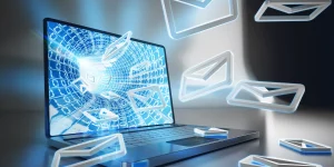 Virtual mail visualized as white envelopes coming out of a computer screen
