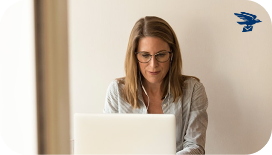 Woman managing her virtual mailbox remotely on her laptop with US Global Mail